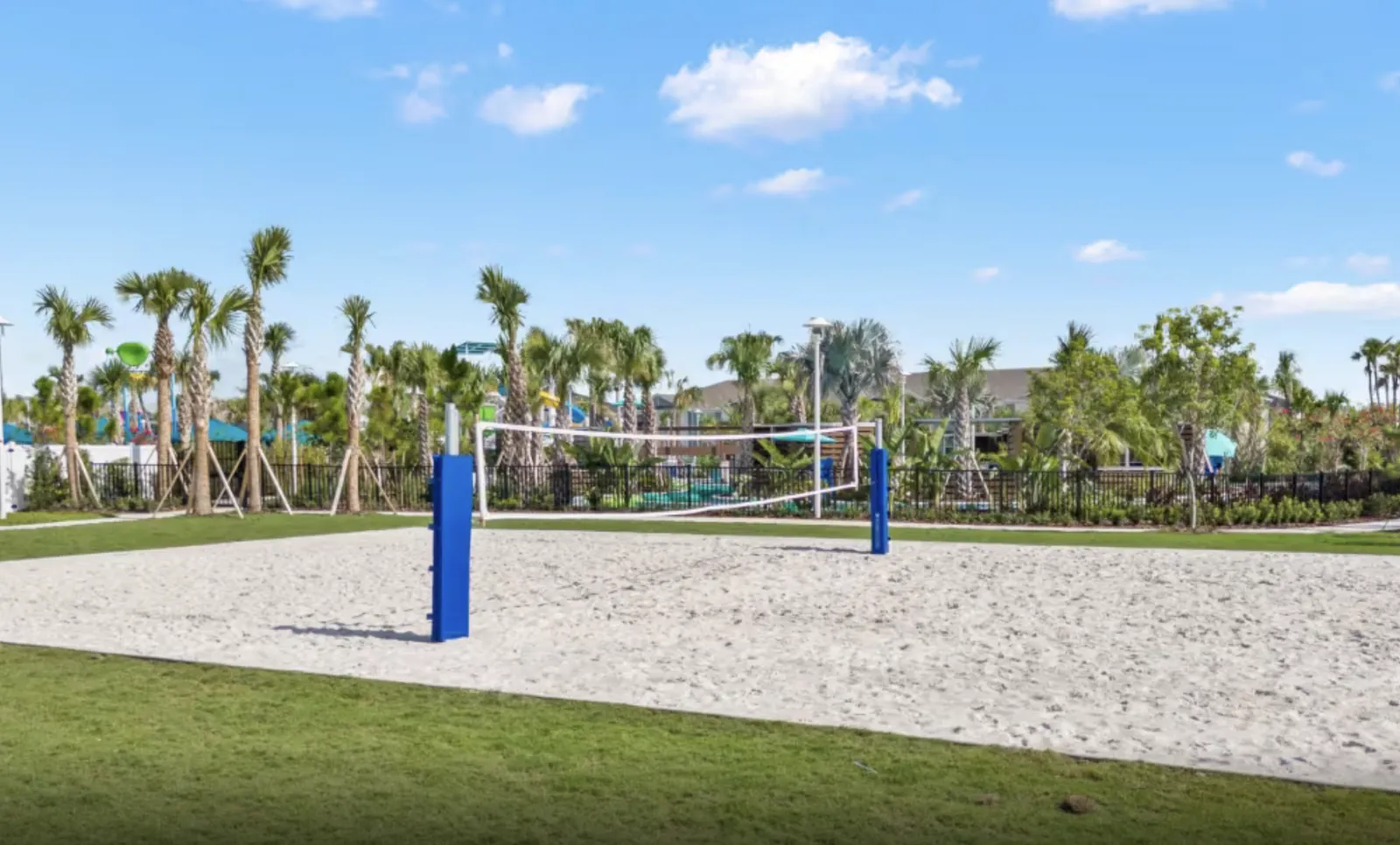 Sand volleyball court and lawn games area at Windsor Cay Resort.
