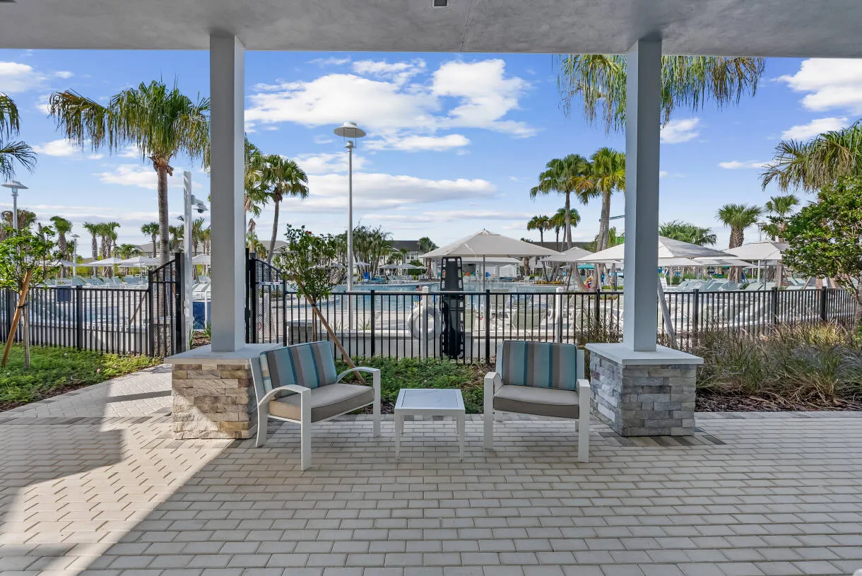 Covered poolside terrace seating at Windsor Cay Resort